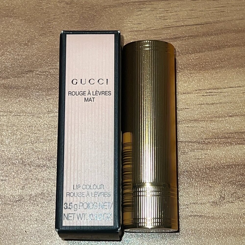 Gucci Velvet Matte Lipstick - Shade: Eva Grape - deep, muted plum